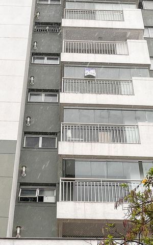 Apartamento à venda com 83m², 2 quartos e 2 vagasFachada + plaquinha