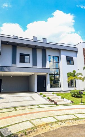 Casa de condomínio à venda com 265m², 4 quartos e 4 vagas Casa de condomínio à venda com 265m², 4 quartos e 4 vagasFachada