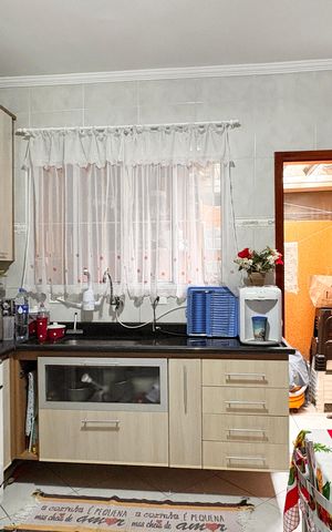 Casa à venda com 110m², 2 quartos e 2 vagas Casa à venda com 110m², 2 quartos e 2 vagasCozinha