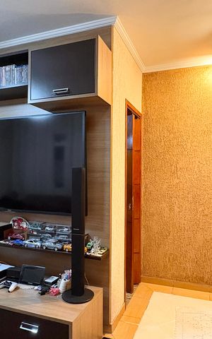 Casa à venda com 110m², 2 quartos e 2 vagas Casa à venda com 110m², 2 quartos e 2 vagasSala