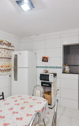 Casa à venda com 200m², 2 quartos e 2 vagasCozinha