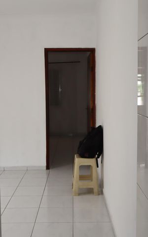 Casa à venda com 100m², 2 quartos e 2 vagasCorredor