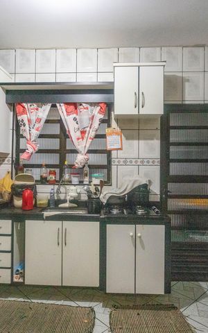 Casa à venda com 160m², 3 quartos e 2 vagasCozinha 