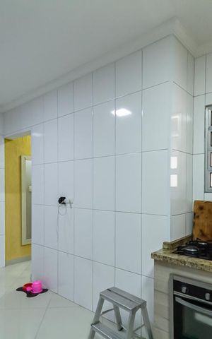 Casa à venda com 130m², 3 quartos e 2 vagas Casa à venda com 130m², 3 quartos e 2 vagasCozinha