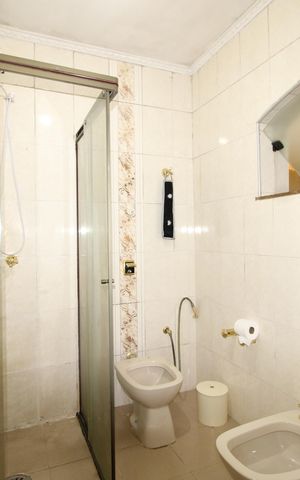 Casa à venda com 300m², 4 quartos e 3 vagasBanheiro da Suíte 3