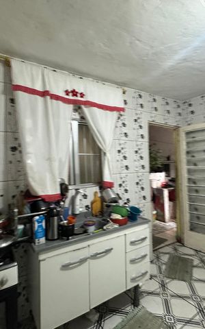 Casa à venda com 250m², 2 quartos e 2 vagas Casa à venda com 250m², 2 quartos e 2 vagasCozinha