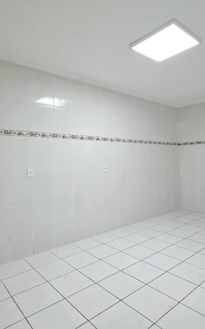 Casa à venda com 110m², 3 quartos e 2 vagas Casa à venda com 110m², 3 quartos e 2 vagasCozinha