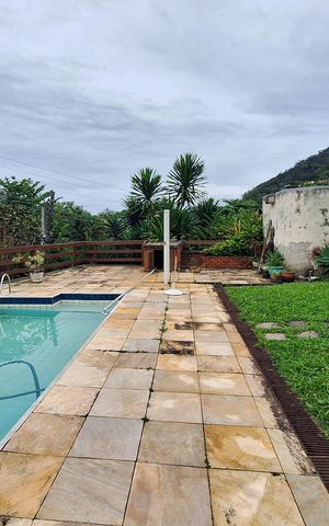 Casa de condomínio à venda com 270m², 4 quartos e 2 vagas Casa de condomínio à venda com 270m², 4 quartos e 2 vagasQuintal
