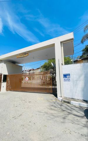 Casa de condomínio para alugar com 60m², 2 quartos e 2 vagas Casa de condomínio para alugar com 60m², 2 quartos e 2 vagasFachada do condomínio com placa
