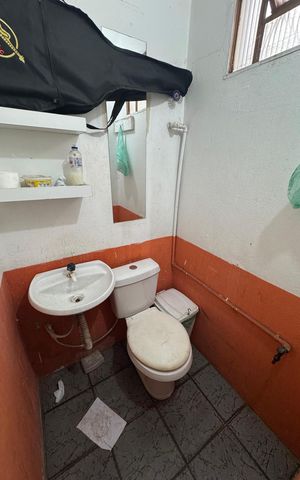 Casa à venda com 250m², 2 quartos e 2 vagasBanheiro da Loja