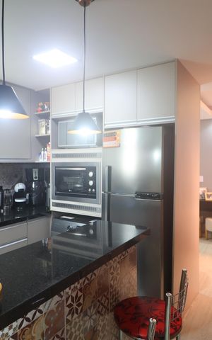 Apartamento à venda com 48m², 2 quartos e 1 vagaCozinha e Área de Serviço