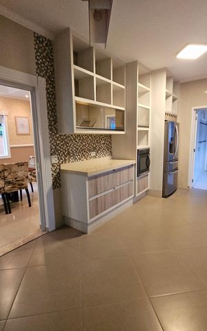 Casa de condomínio para alugar com 300m², 5 quartos e 4 vagasCozinha