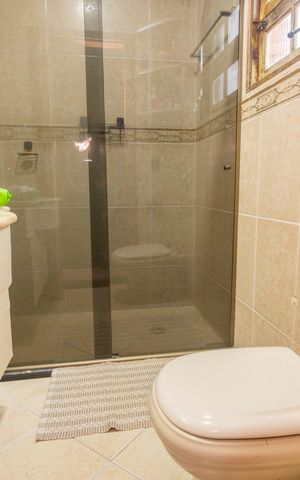 Casa à venda com 400m², 4 quartos e 3 vagasBanheiro da Suíte 2