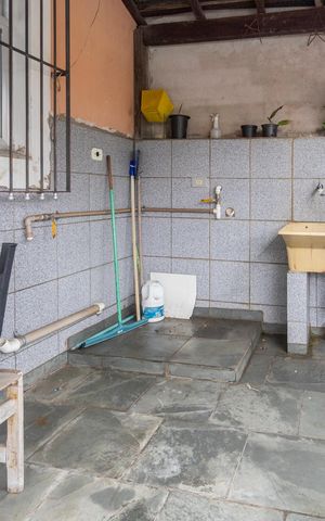Casa à venda com 400m², 4 quartos e 3 vagasCasa 2 - Área de serviço