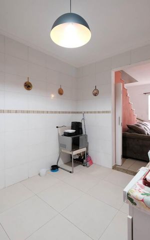 Casa de condomínio à venda com 70m², 2 quartos e 1 vagaCozinha e Área de Serviço