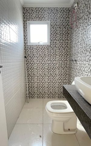 Casa à venda com 164m², 3 quartos e 3 vagasBanheiro 2