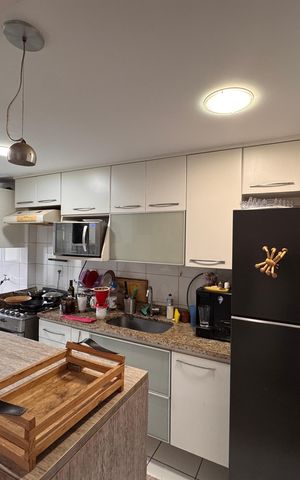 Apartamento à venda com 80m², 3 quartos e 1 vaga Apartamento à venda com 80m², 3 quartos e 1 vagaCozinha e Área de Serviço