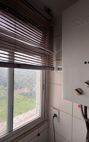 Apartamento à venda com 80m², 3 quartos e 1 vaga Apartamento à venda com 80m², 3 quartos e 1 vagaCozinha e Área de Serviço