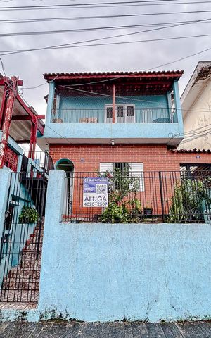 Casa para alugar com 75m², 2 quartos e sem vagaFachada com Plaquinha