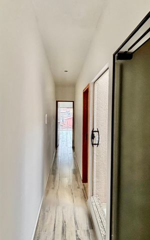 Casa à venda com 135m², 3 quartos e 2 vagas Casa à venda com 135m², 3 quartos e 2 vagasCorredor