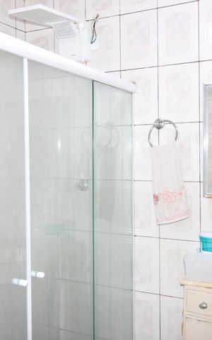 Casa à venda com 329m², 4 quartos e 3 vagasBanheiro da Suíte