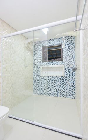 Casa para alugar com 65m², 2 quartos e 2 vagasBanheiro da Suíte