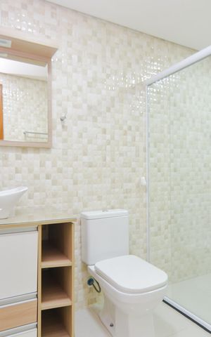 Casa para alugar com 65m², 2 quartos e 2 vagasBanheiro da Suíte