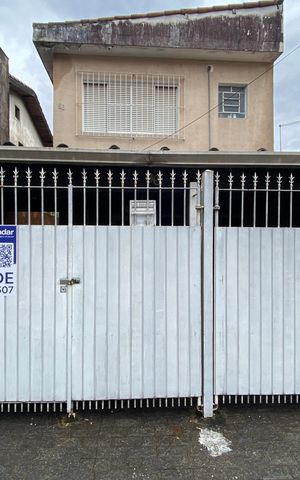 Casa à venda com 164m², 3 quartos e 2 vagas Casa à venda com 164m², 3 quartos e 2 vagasFachada - Placa