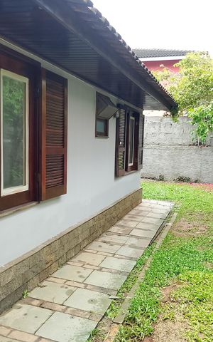 Casa de condomínio para alugar com 400m², 5 quartos e 2 vagas