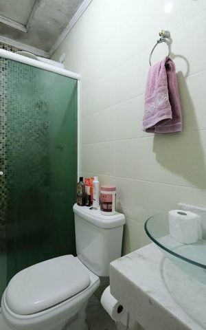 Casa à venda com 119m², 3 quartos e 3 vagasBanheiro