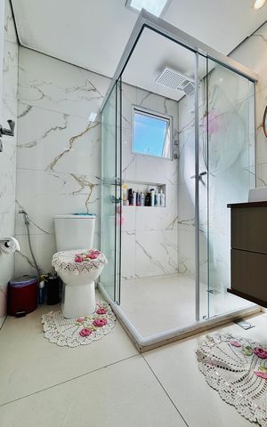 Casa de condomínio à venda com 134m², 3 quartos e 2 vagasBanheiro da Suíte