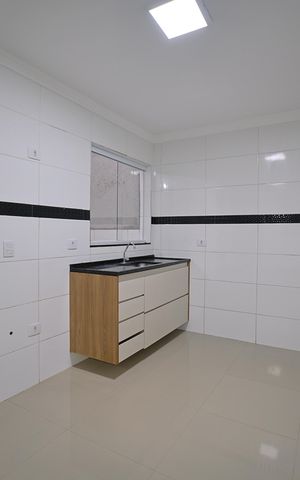 Casa de condomínio para alugar com 57m², 2 quartos e sem vagaCozinha