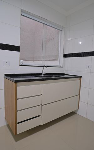 Casa de condomínio para alugar com 57m², 2 quartos e sem vagaCozinha