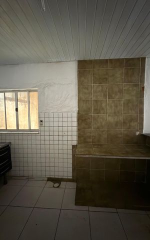 Casa à venda com 100m², 2 quartos e 2 vagasCozinha 