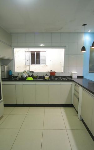 Casa à venda com 100m², 6 quartos e 2 vagasCasa 3 - Sala / Cozinha 