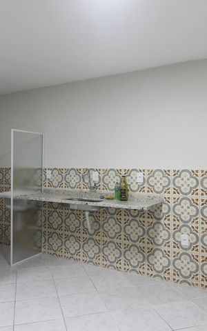 Casa para alugar com 60m², 2 quartos e 2 vagasCozinha