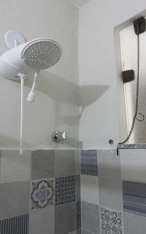 Casa para alugar com 60m², 2 quartos e 2 vagasBanheiro da Suíte