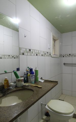 Casa de condomínio para alugar com 240m², 4 quartos e 4 vagasBanheiro Social