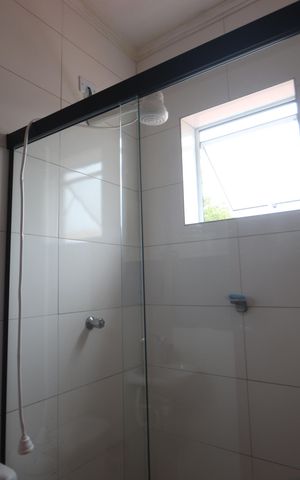 Casa à venda com 120m², 2 quartos e 2 vagasBanheiro da Suíte 1