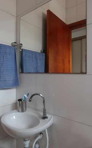 Casa à venda com 120m², 2 quartos e 2 vagasBanheiro da Suíte 1