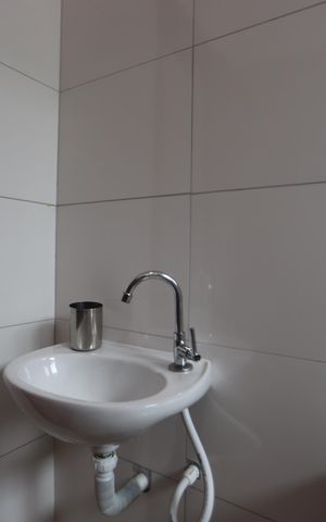 Casa à venda com 120m², 2 quartos e 2 vagasBanheiro da Suíte 2