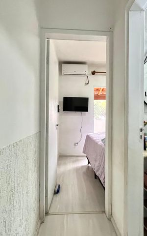 Casa de condomínio à venda com 60m², 2 quartos e 1 vaga Casa de condomínio à venda com 60m², 2 quartos e 1 vagaCorredor