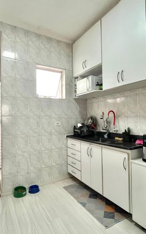 Casa de condomínio à venda com 60m², 2 quartos e 1 vaga Casa de condomínio à venda com 60m², 2 quartos e 1 vagaCozinha