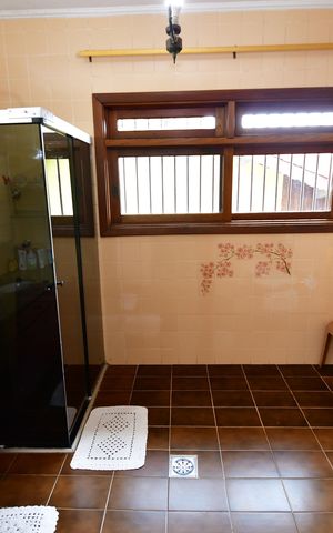 Casa para alugar com 438m², 4 quartos e 4 vagasBanheiro Suíte