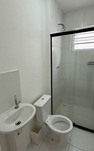 Casa de condomínio para alugar com 59m², 2 quartos e 1 vagaBanheiro