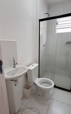 Casa de condomínio para alugar com 59m², 2 quartos e 1 vagaBanheiro