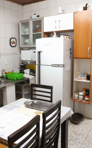 Casa à venda com 250m², 3 quartos e 3 vagas Casa à venda com 250m², 3 quartos e 3 vagasCozinha