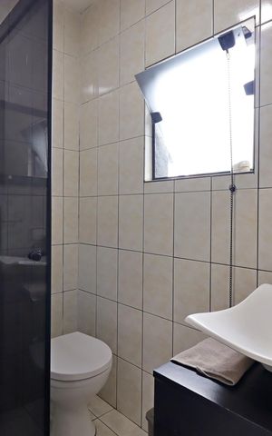 Casa à venda com 162m², 2 quartos e 2 vagasBanheiro da Suíte