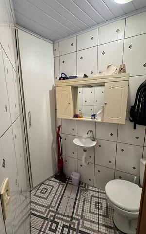 Casa à venda com 120m², 3 quartos e 1 vaga Casa à venda com 120m², 3 quartos e 1 vagaBanheiro 2