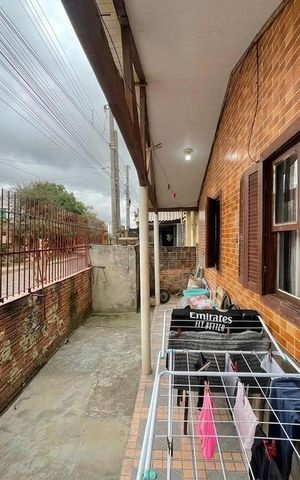 Casa à venda com 80m², 3 quartos e 2 vagas Casa à venda com 80m², 3 quartos e 2 vagasÁrea externa